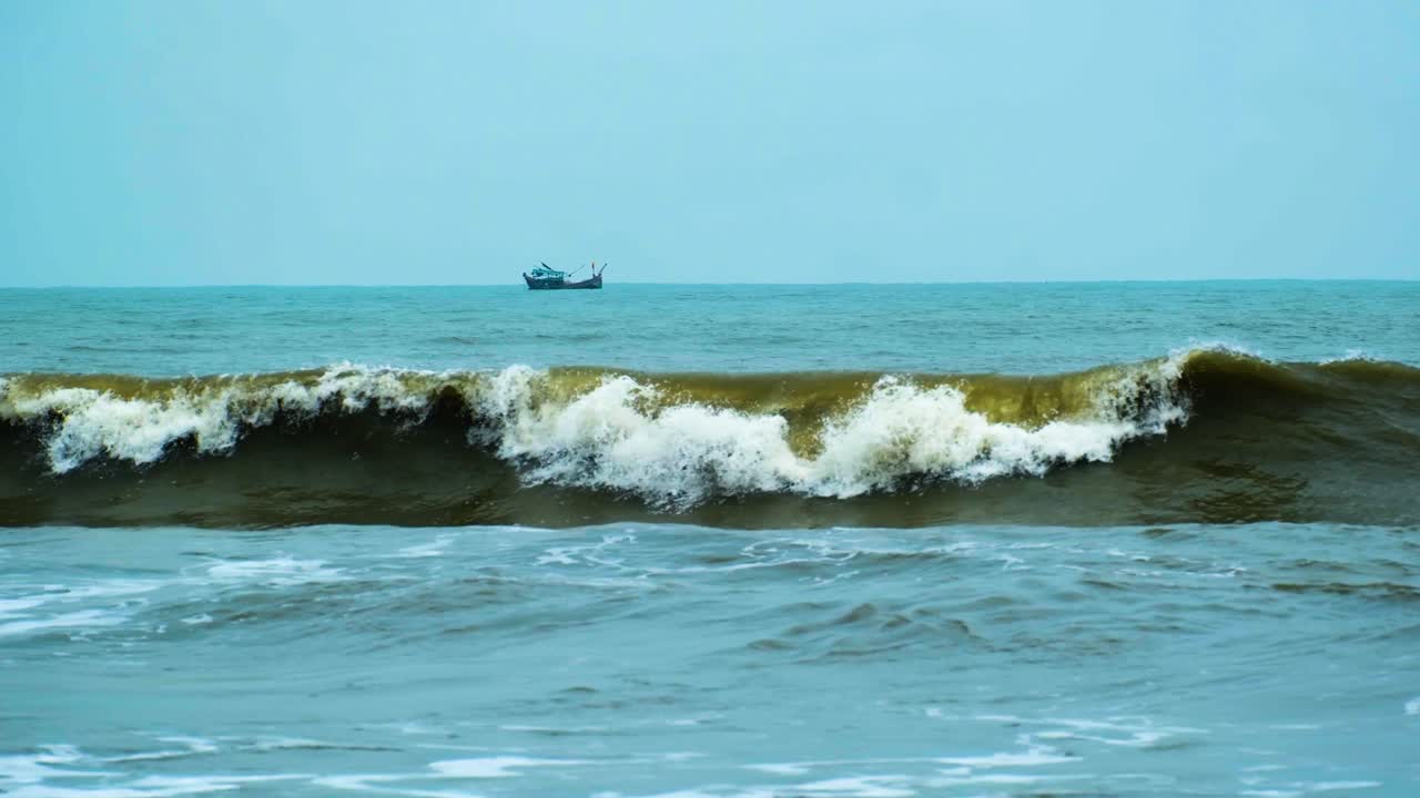 Fishing trawler sailing in the Indian Ocean near the Bay of Bengal in Kuakata waters, Bangladesh