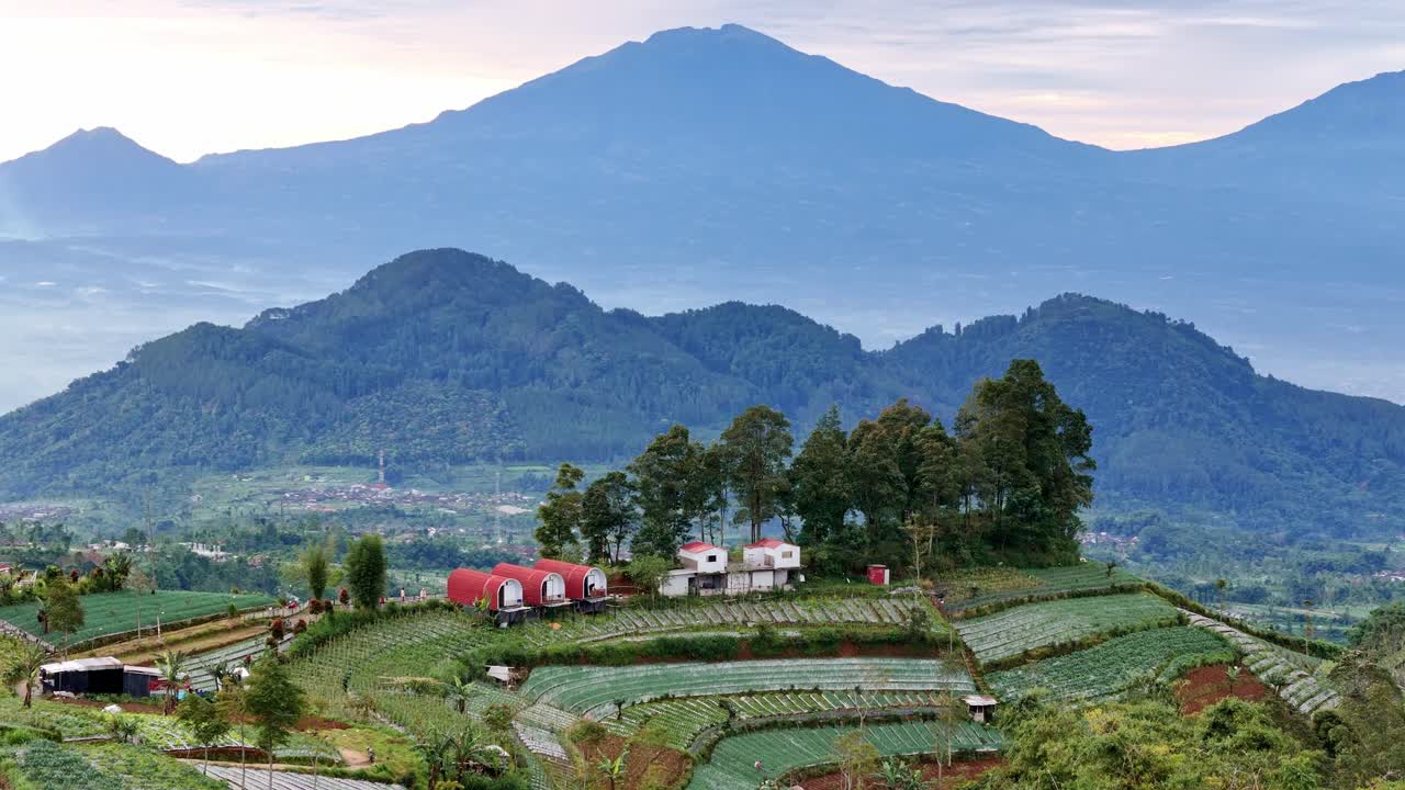 Breathtaking scenery of rural landscape with mountain background.
