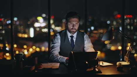 night man working project surfing computer in office. pensive sales expert think