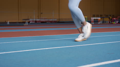 woman warming up indoors