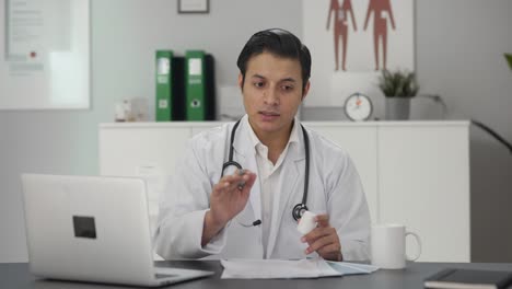 Indian-doctor-giving-medicine-to-patient