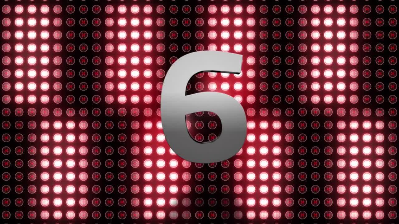 Animation of countdown from ten to one over red glowing lights of digital display in the background