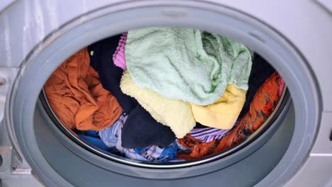 Close-up-of-cloths-in-a-washing-machine