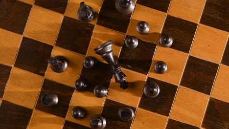 game of chess, beaten king on chessboard