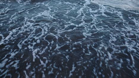 wide shot of ocean waves splashing on the beach