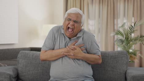 Sick-Indian-old-man-having-a-heart-attack