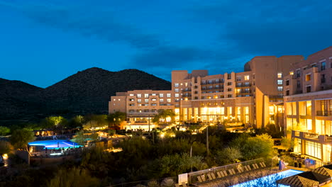 time lapse of a cool blue sunrise over a hotel establishment in tucson, arizona