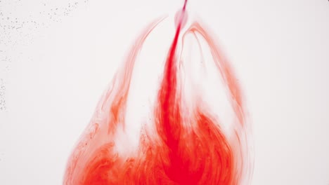 liquid with tiny transparent bubbles is injected into white one
