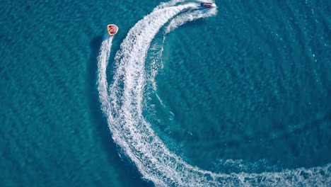 birds eye view of a speed boat in the middle of the mediterranean sea