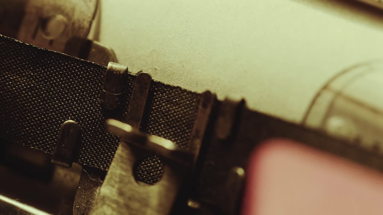 Analog Typewriter Printing Word Stop with Exclamation Marks on Paper