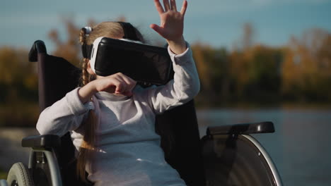 Child-in-wheelchair-plays-game-in-virtual-reality-glasses