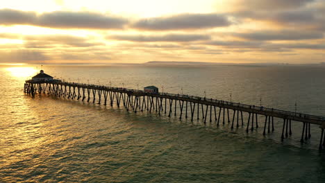 imperial beach pier silhouette against sunset sky in san diego, california, usa