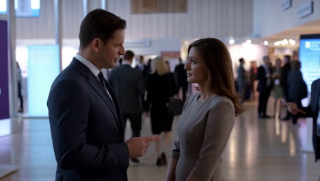 business professionals conversing at a conference