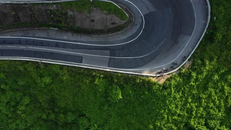 rising over winding hillside road