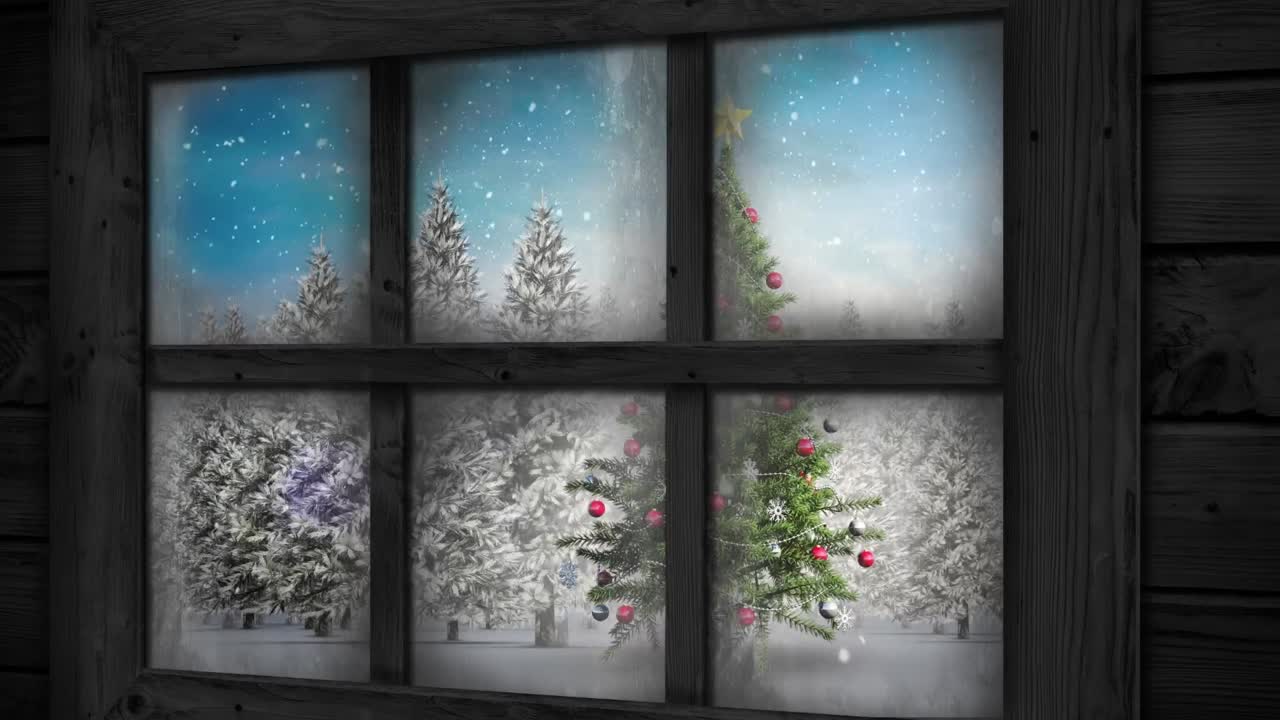 Wooden window frame against snow falling over christmas tree on winter landscape