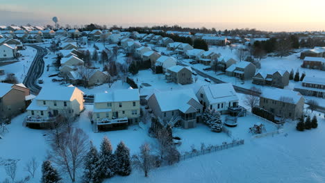 homes in usa neighborhood covered in fresh winter snow