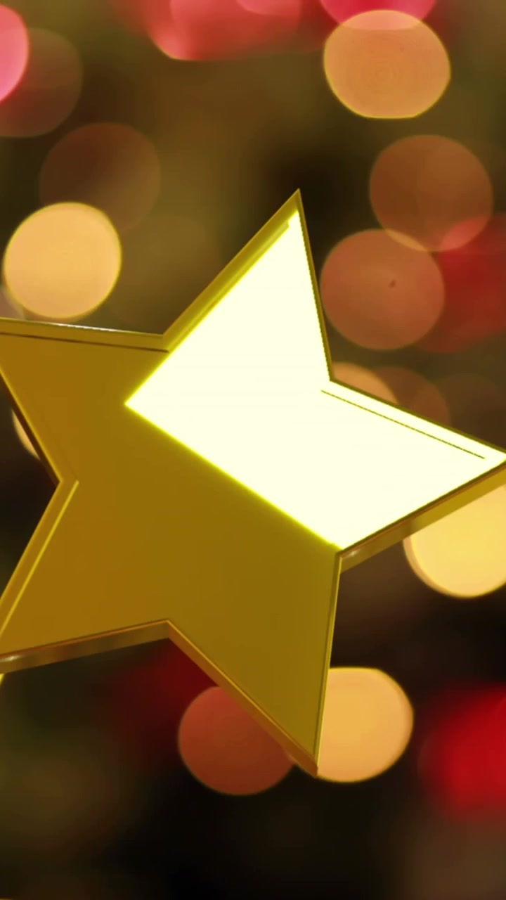 Animazione di stella natalizia dorata su luci tremolanti dell'albero di Natale sullo sfondo