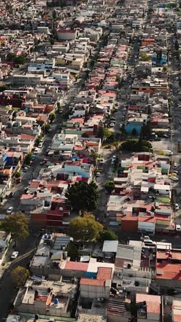 drone footage capturing the everyday life of an ecatepec neighborhood, vertical shot