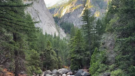 view of yosemite valley from lower yosemite falls during sunrise tilt up