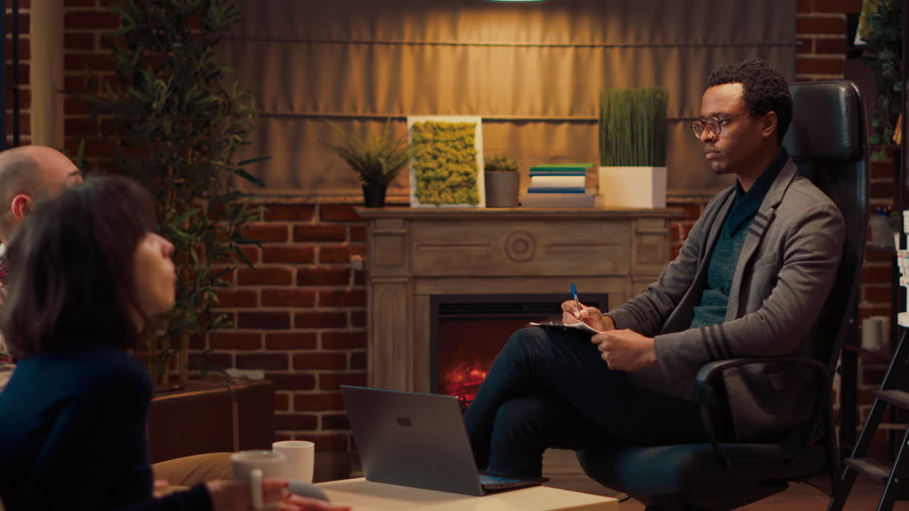 Psychology consultant listening to people with marriage problems