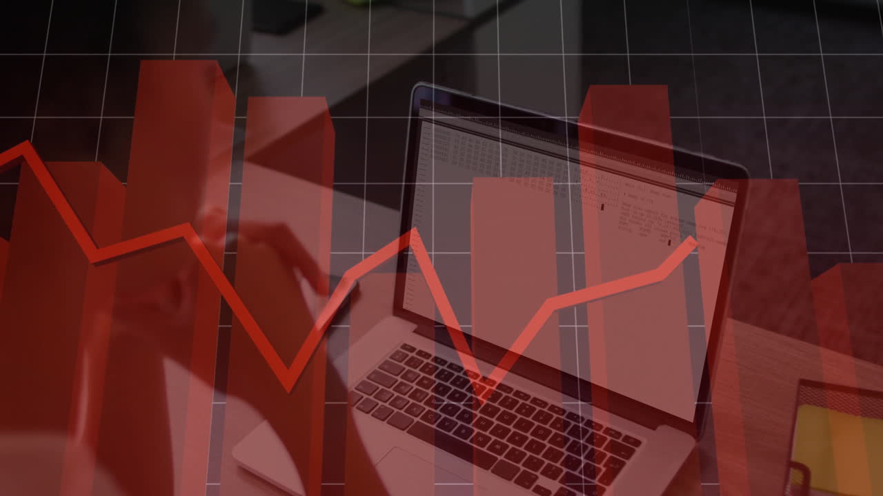 Woman's hand hovering over laptop keyboard in finance office, showing red bar chart overlay