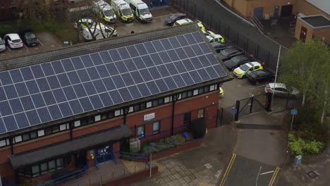 Exterior-of-town-police-station-with-solar-panel-renewable-energy-rooftop-in-Cheshire-townscape-aerial-view