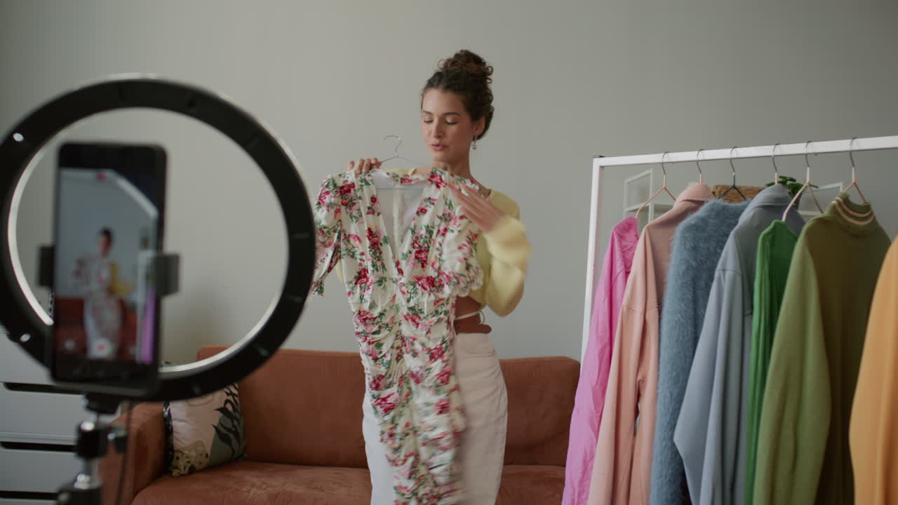 Female Stylist Presenting Outfits as Recording Social Media Vlog