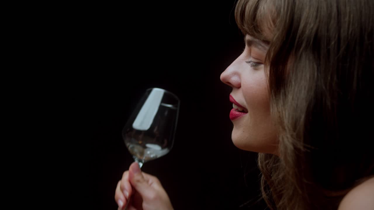 Woman with Red Lipstick Enjoying Wine