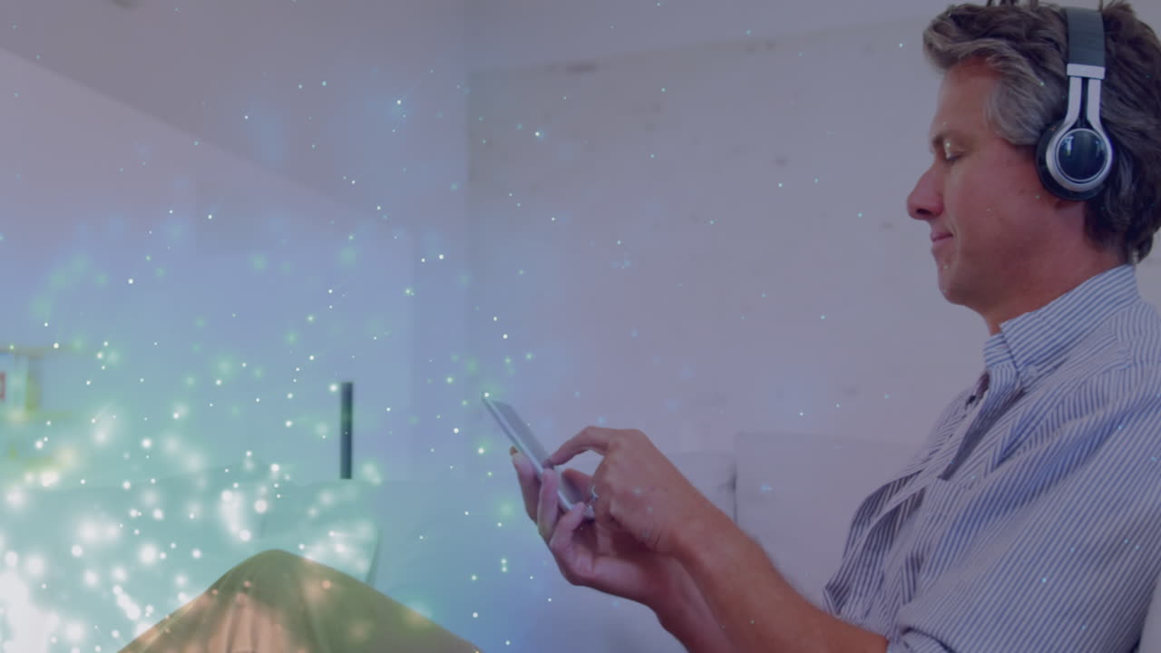 Animation of light spots over caucasian man using smartphone