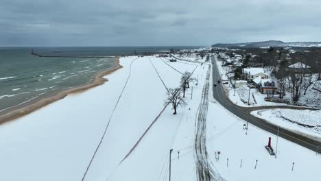 light traffic along the frozen coast of lake michigan