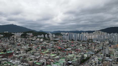 Aerial-shot-flying-over-Daejeon-city-in-a-densely-populated-area,-South-Korea