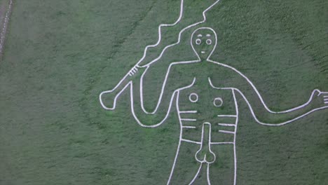 figure-in-a-grassy-field,-Cerne-Abbas-giant-in-England,-Dorset