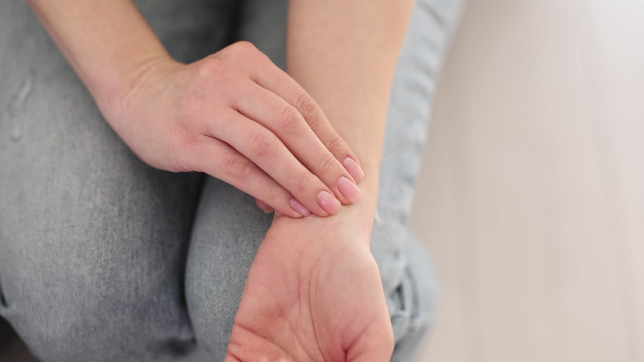 Checking pulse on wrist