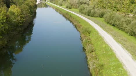 Aerial-flight-over-a-large-bend-in-the-Isar-River-near-Munich-in-the-Bavarian-state-of-Germany