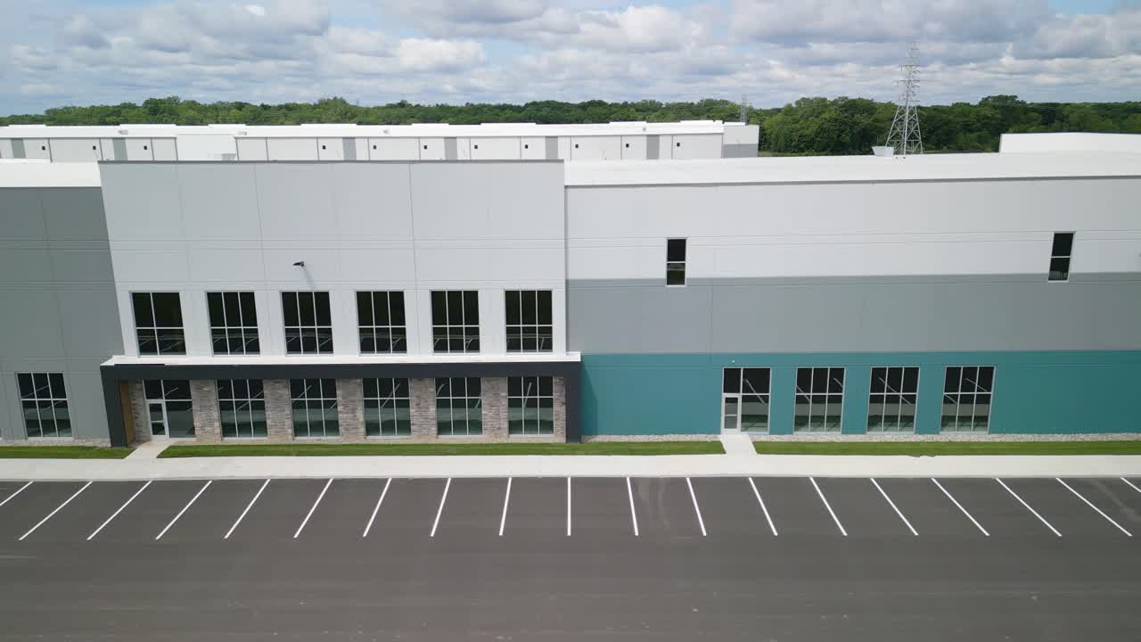 Close Up Aerial View of Modern Warehouse - Logistics and Supply Chain Efficiencies