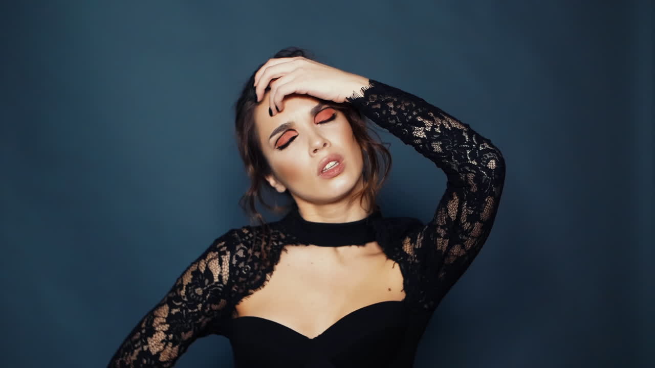 Brunette lady has headache. Painful girl suffering migraine touching forehead