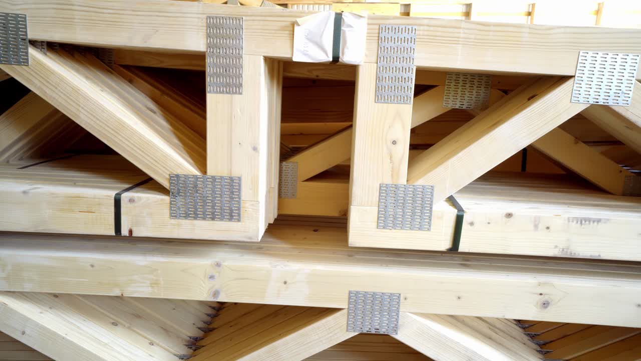 Wood web joist packed and stacked on top of each other, ready for transport