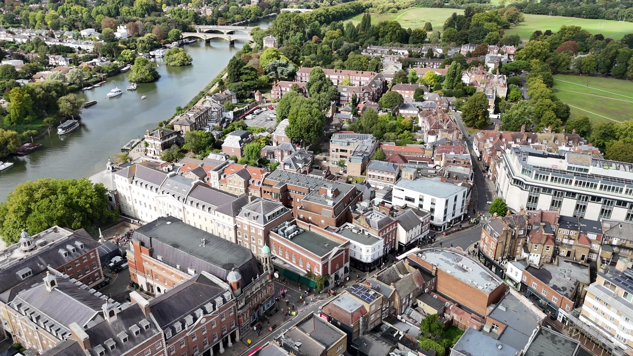 Richmond Town Centre London UK pull back drone aerial reverse reveal