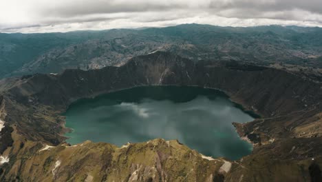 panoramic view of wonderful crater lake landscape surrounded by volcanoes in ecuador