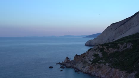 The-beautiful-Kastro-beach-at-sunset-time-filmed-from-above