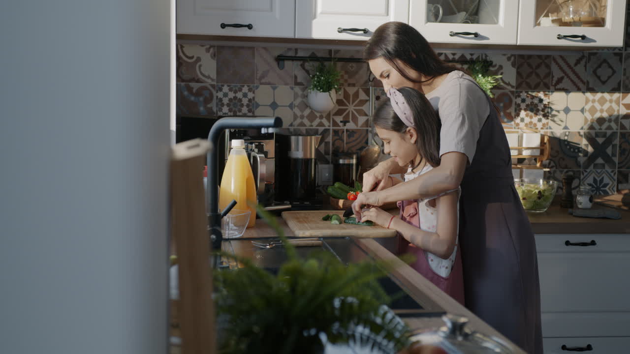 Mother and Daughter Cooking Together