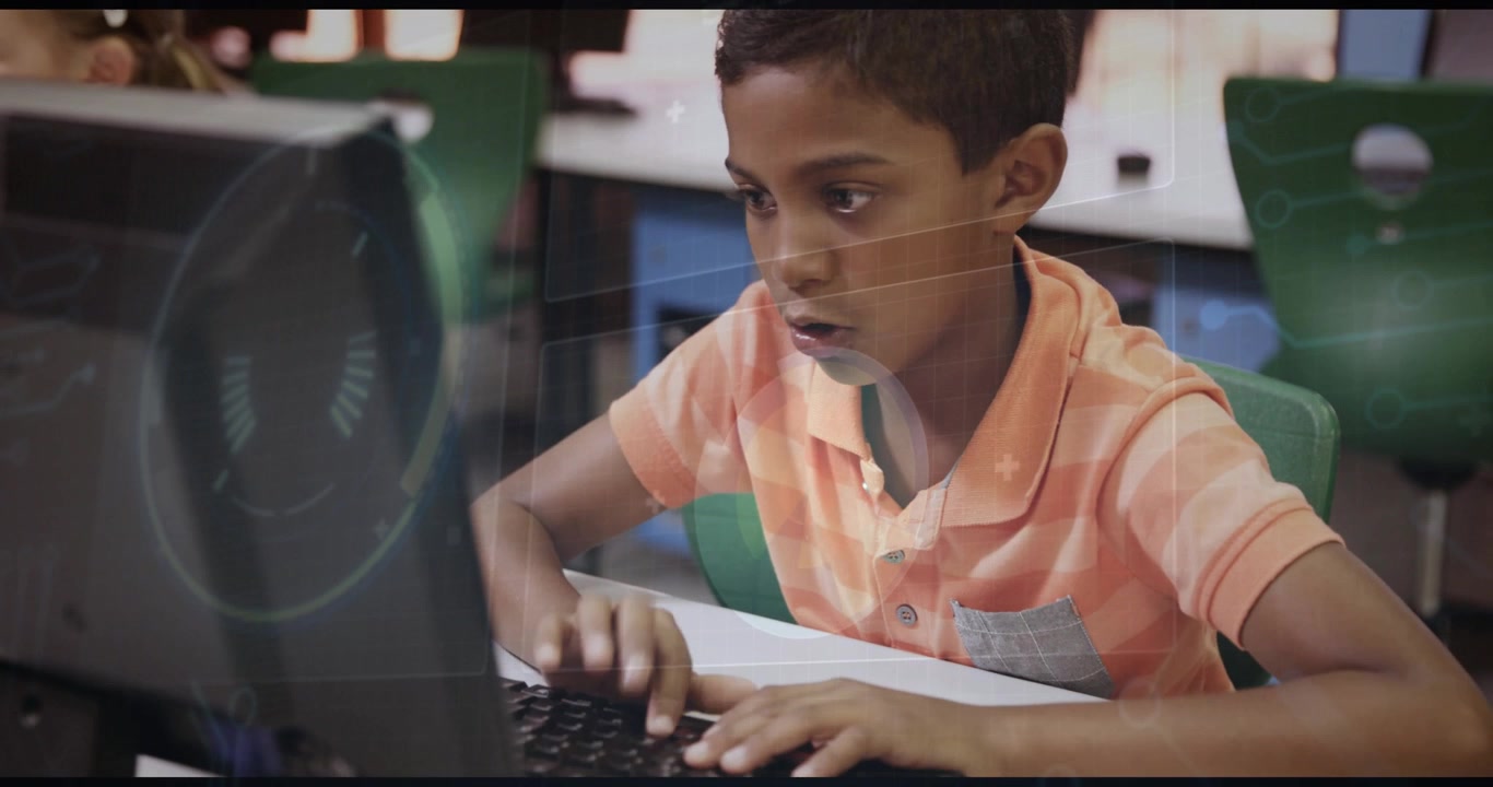 Boy placing fingers on keys, typing to finish education task, circular overlay highlighting monitor