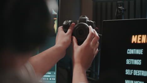photographer adjusting camera settings