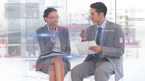 Animation-of-data-processing-over-caucasian-businessman-and-businessman-discussing-over-documents