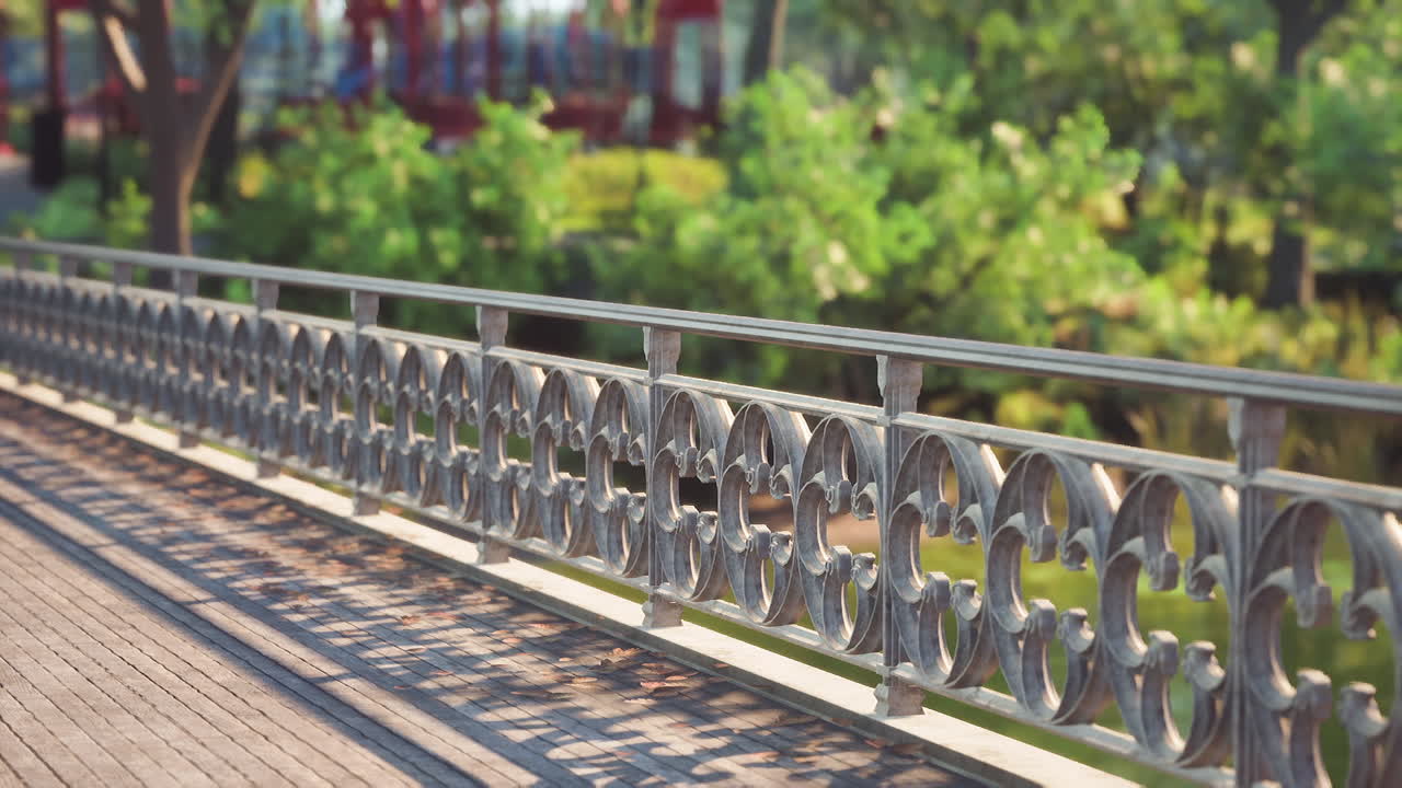 A decorative railing along a scenic path in a vibrant park during daytime