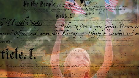 written constitution of the united states and a child holding an american flag 4k