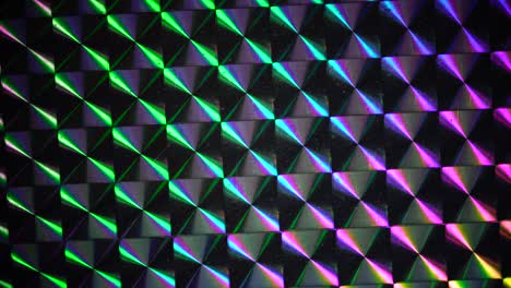 real shiny led light moving over silver rainbow holo foil