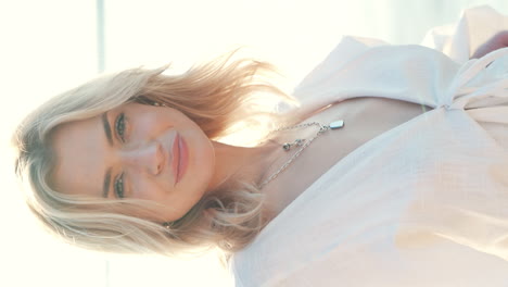 happy woman in a white top