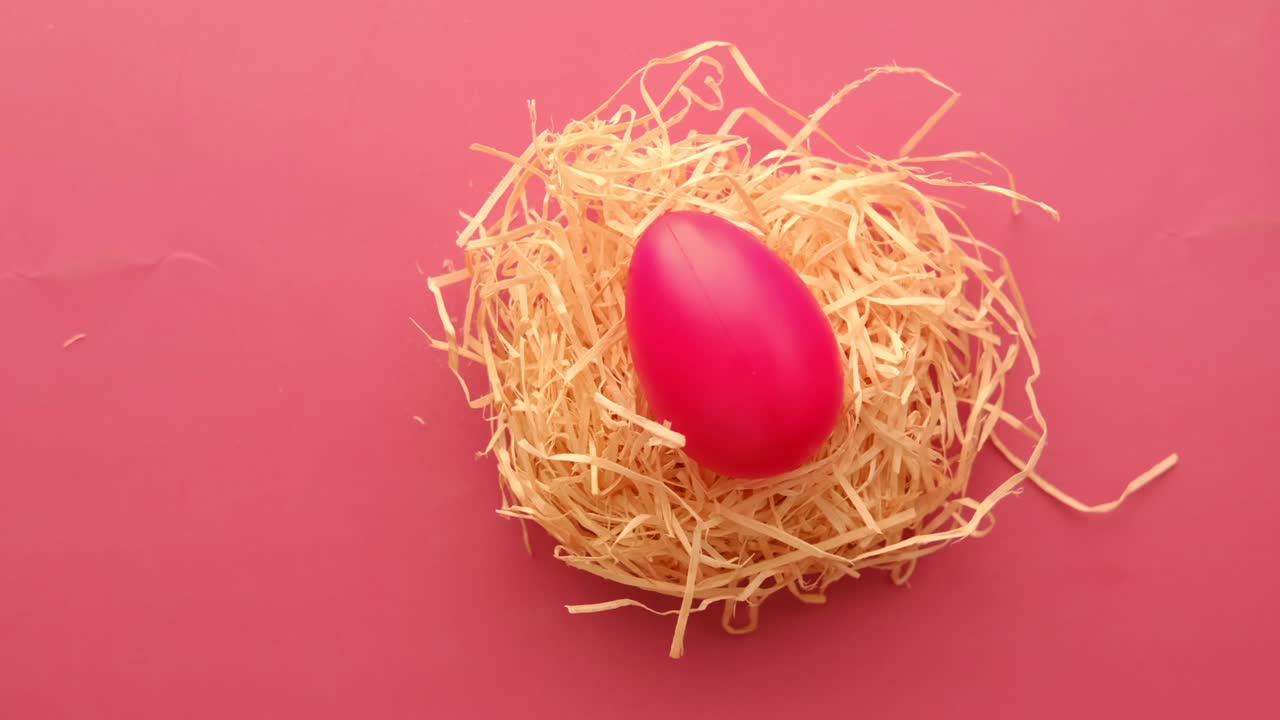 easter concept with a red color egg on table