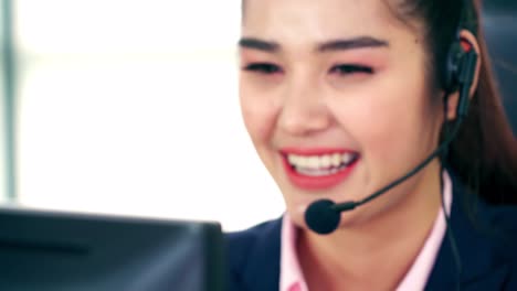 business people wearing headset working in office